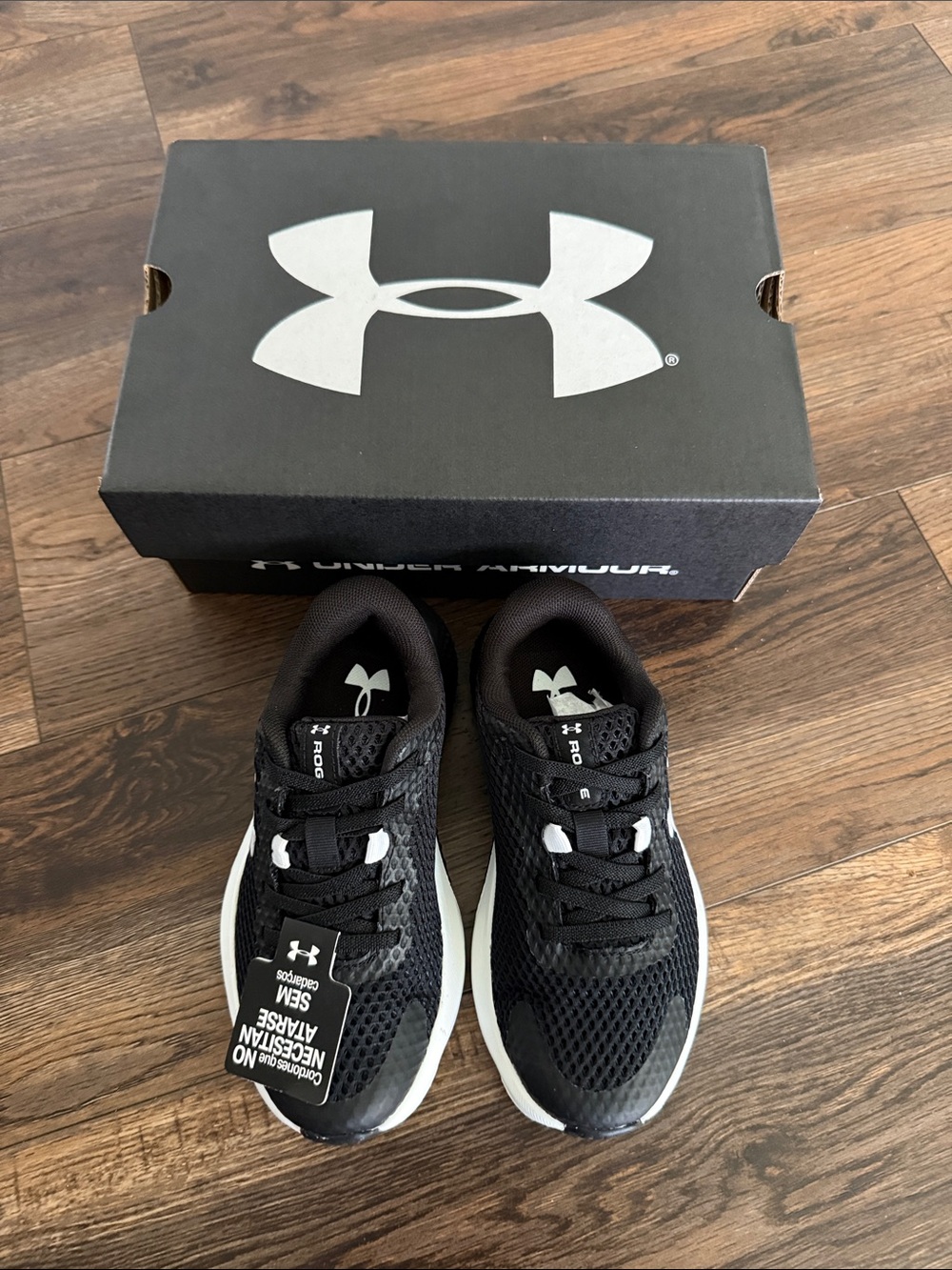 Under Armour toddler Black and White Athletic Running Shoes